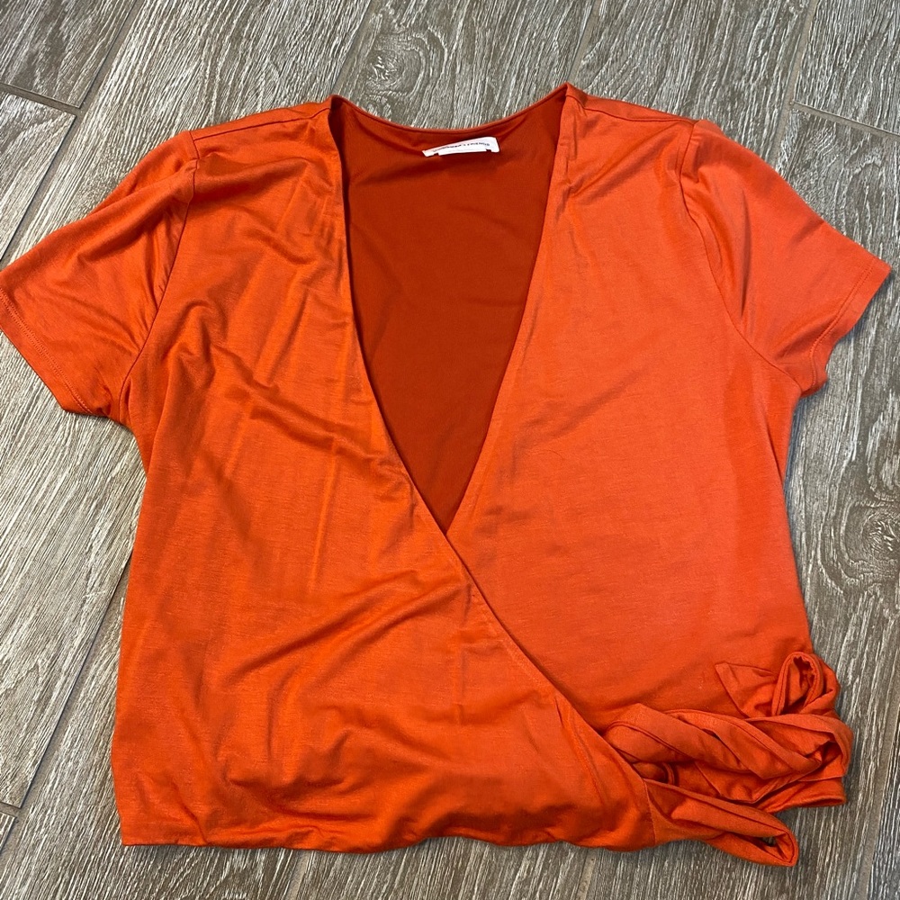 Orange Lovers + Friends wrap top size M
